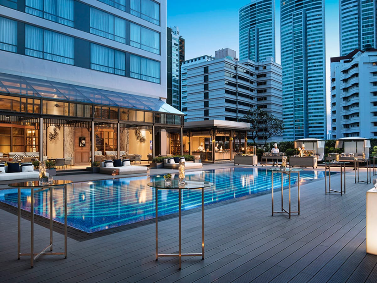 Resort hotel pool at dusk